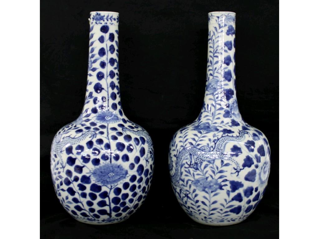 Appraisal: Pair of Chinese blue and white bottle vases decorated overall