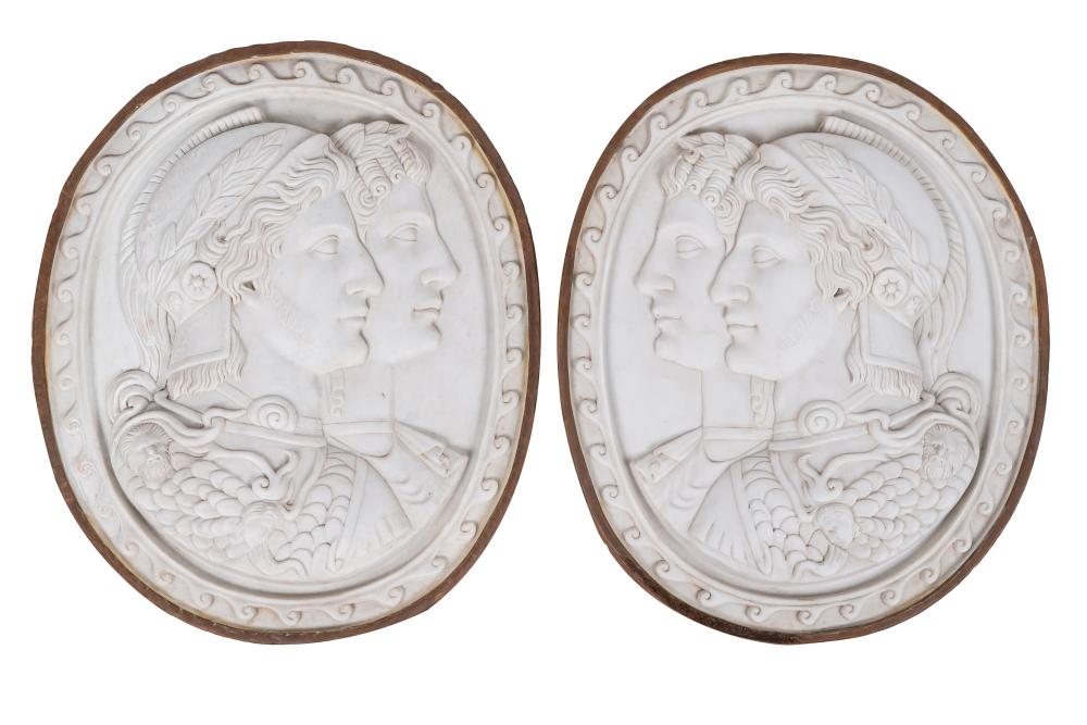 Appraisal: PAIR OF ITALIAN MARBLE RELIEF PLAQUESeach oval with iron mounts