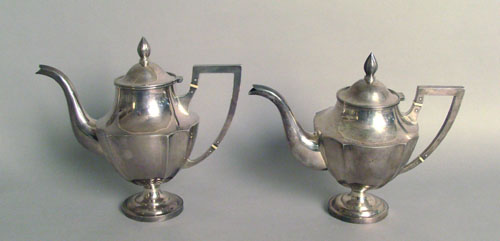 Appraisal: Two Chinese silver teapots ca h h ozt