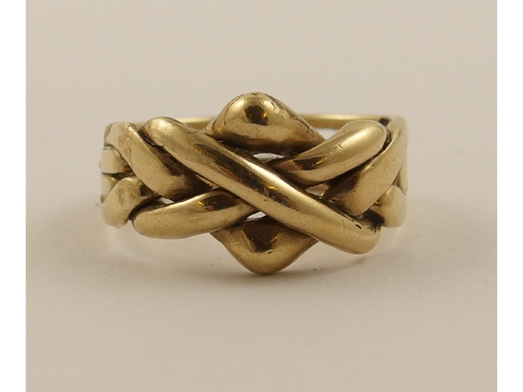 Appraisal: A ct gents puzzle ring