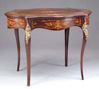 Appraisal: INLAID AND BRASS MOUNTED CENTER TABLE BY HORNER Turtle shaped