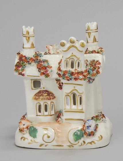 Appraisal: STAFFORDSHIRE PASTILLE BURNER Mid- th CenturyIn three-story cottage form with