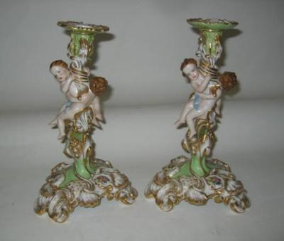 Appraisal: A PAIR OF CONTINENTAL PORCELAIN CANDLESTICKS late th century in