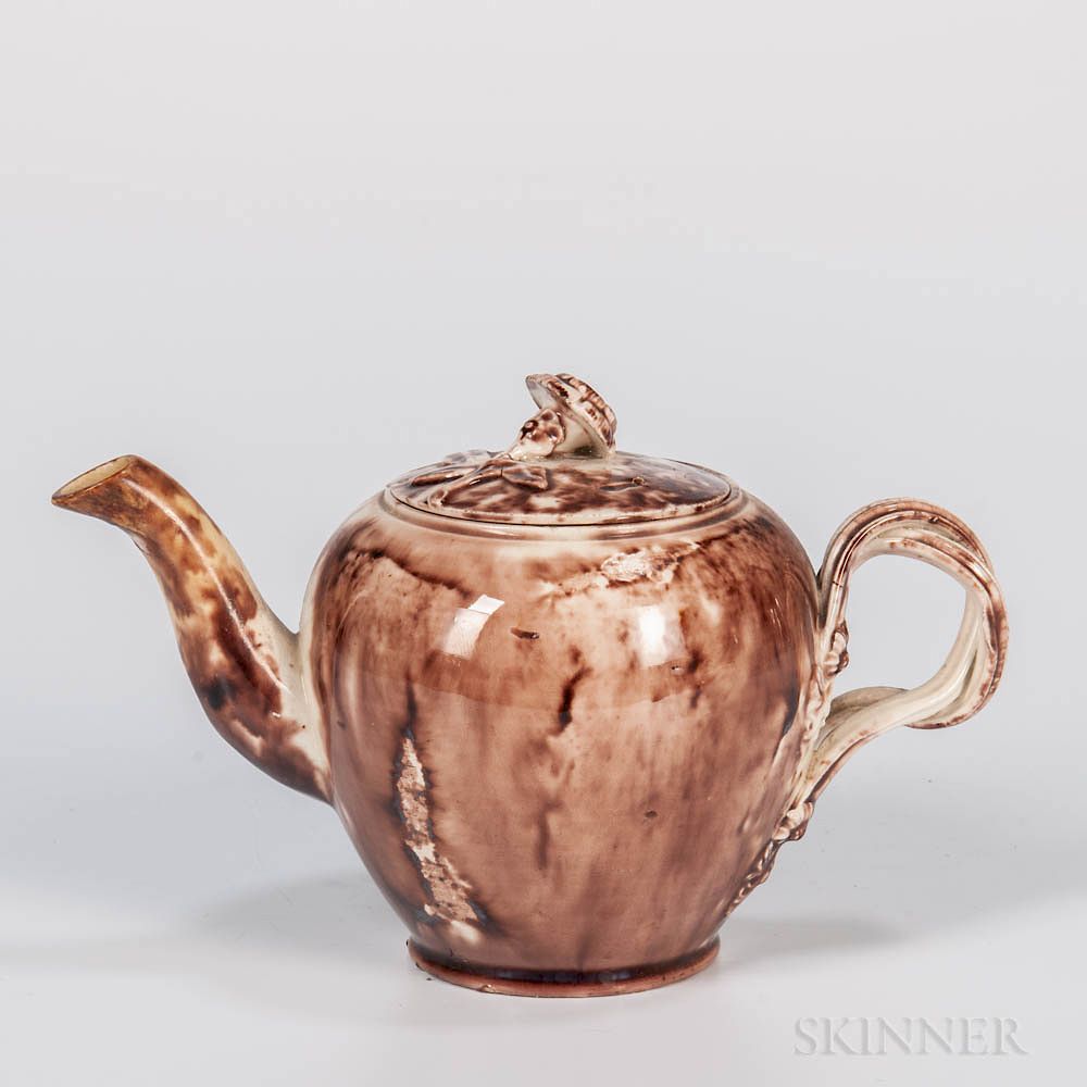 Appraisal: Staffordshire Lead-glazed Creamware Teapot and a Cover Staffordshire Lead-glazed Creamware