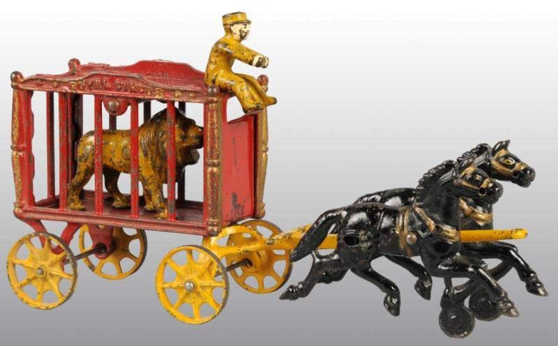 Appraisal: Cast Iron -Horse Royal Circus Cage Wagon Toy Description All