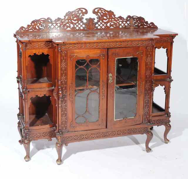 Appraisal: A LATE VICTORIAN MAHOGANY SIDE CABINET the raised pierced fretwork