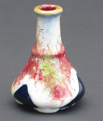 Appraisal: A rare Royal Doulton Chang miniature vase covered in a