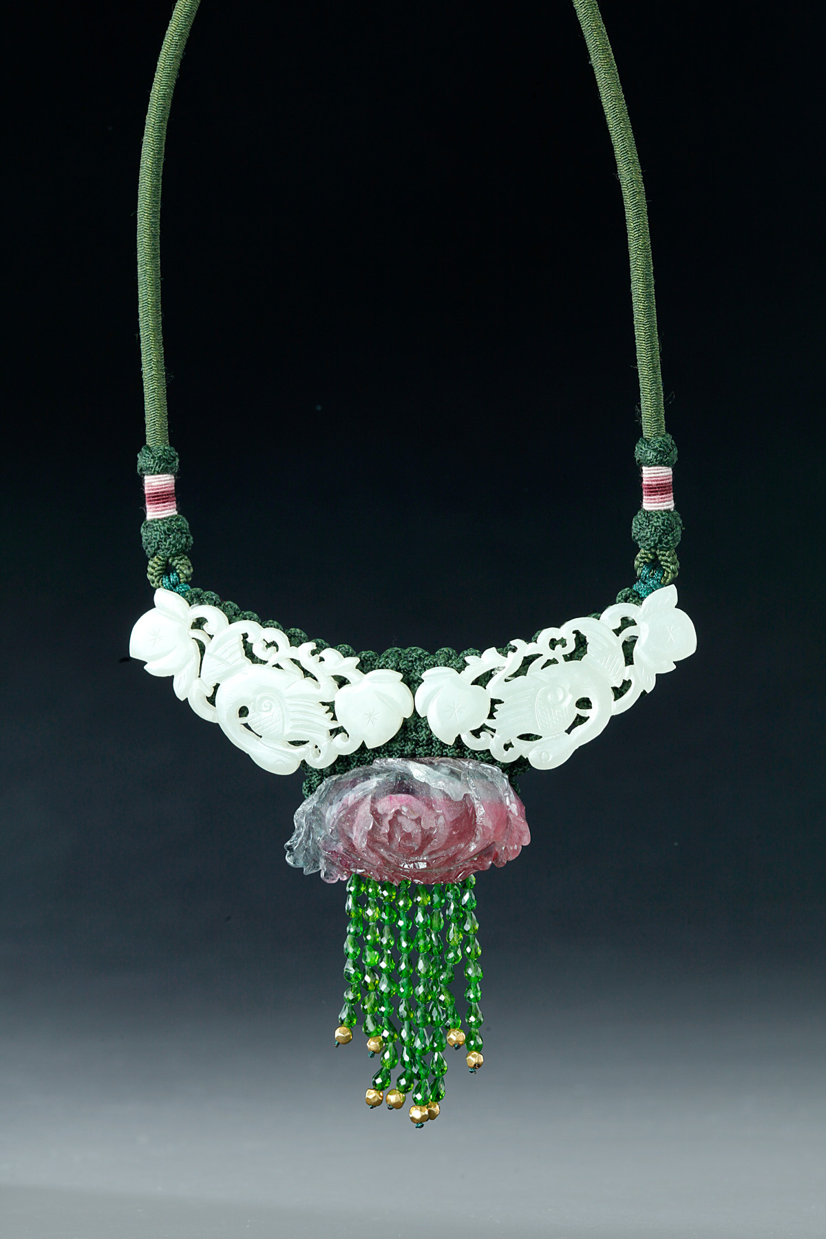 Appraisal: CHINESE WHITE JADE AND TOURMALINE NECKLACE Nineteenth century Two pieces