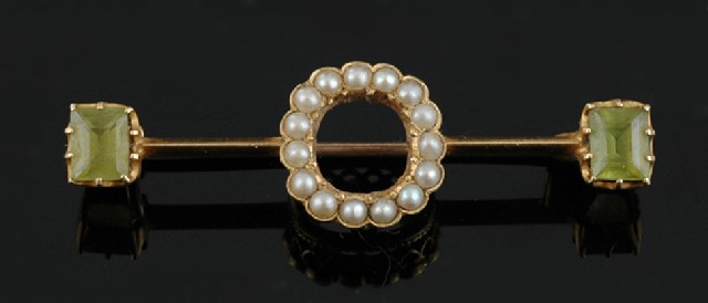 Appraisal: An Antique peridot and seed pearl bar brooch The ct