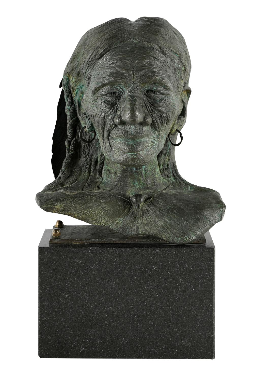 Appraisal: TH CENTURY BUST OF A NATIVE AMERICANbronze with green patina