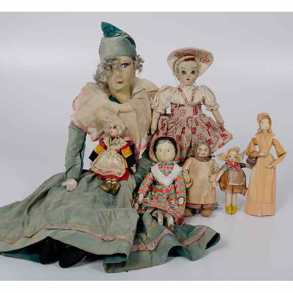 Appraisal: Group of Cloth Wood and Husk Dolls Collection of seven