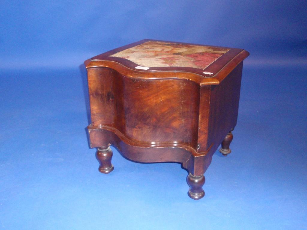 Appraisal: A Victorian flamed mahogany serpentine box commode