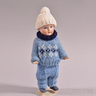 Appraisal: Small All Bisque Boy Doll in Knit Wool Clothing ht