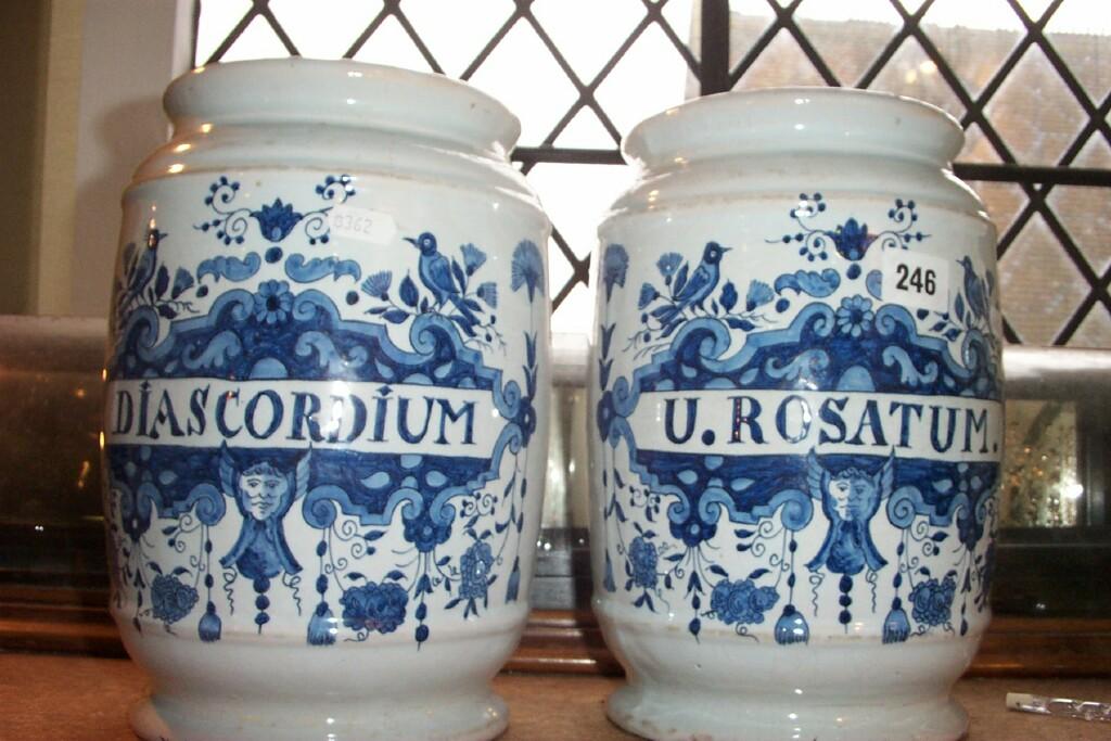 Appraisal: A pair of tin glazed earthenware drug jars with blue