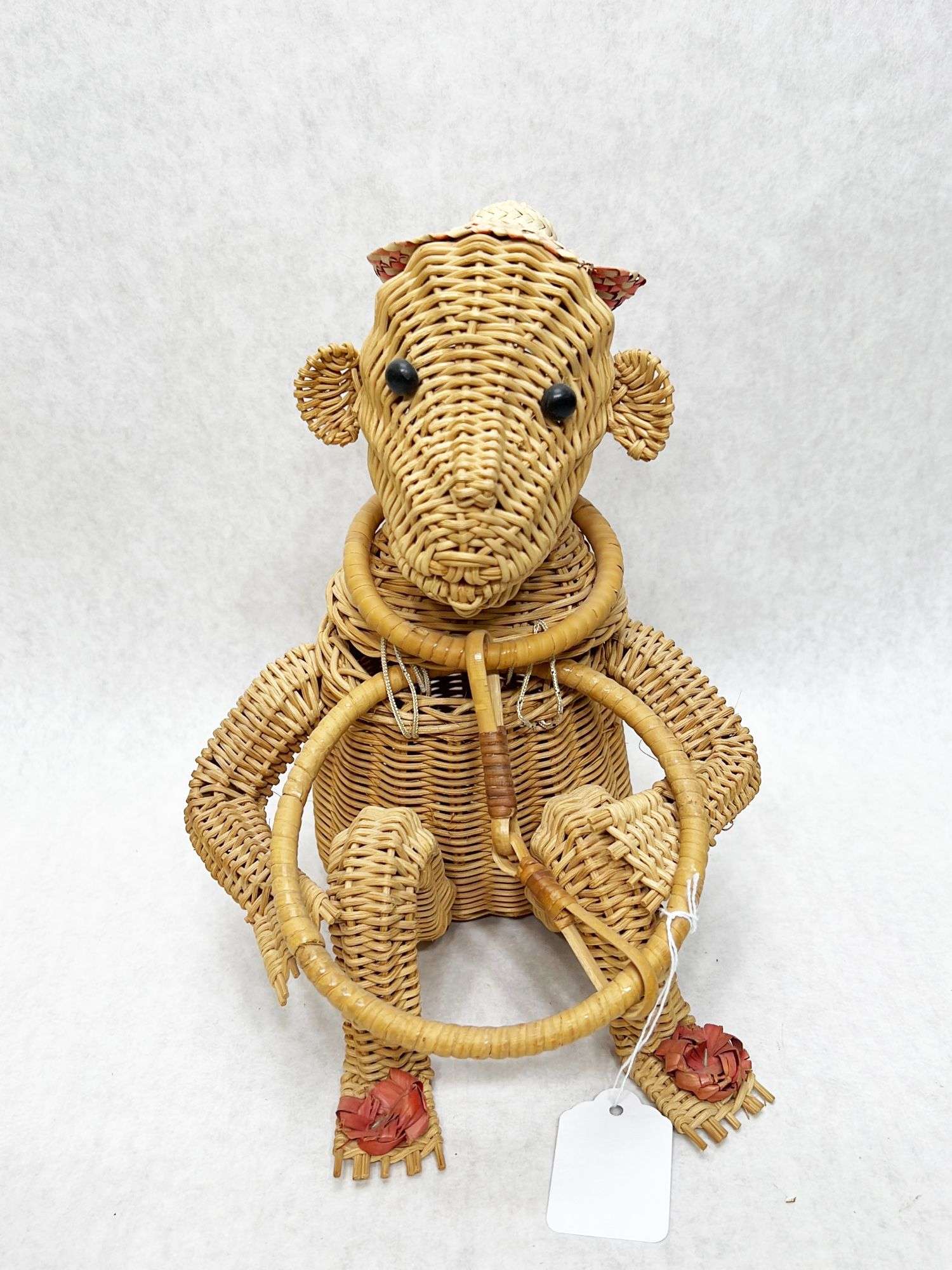 Appraisal: Figural Wicker Monkey Purse tall Condition Good no noticeable damage