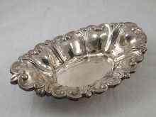 Appraisal: A silver pierced and lobed oval bread dish Birmingham approx