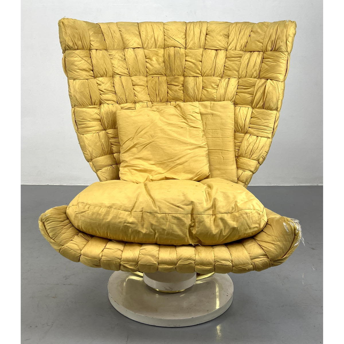 Appraisal: Marzio Cecchi 's swivel lounge chair Woven Yellow fabric Dimensions