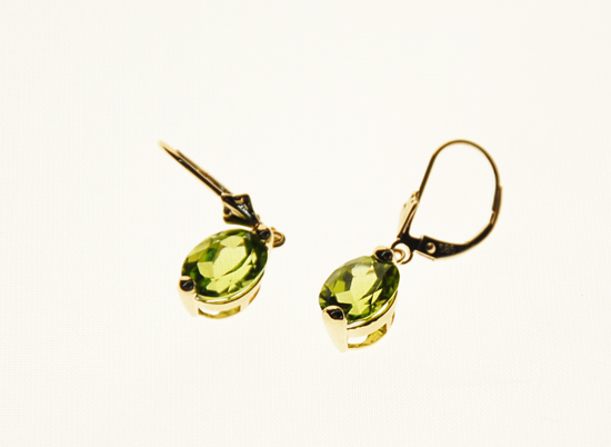 Appraisal: A Pair of Gold and Peridot Earrings K marked yellow