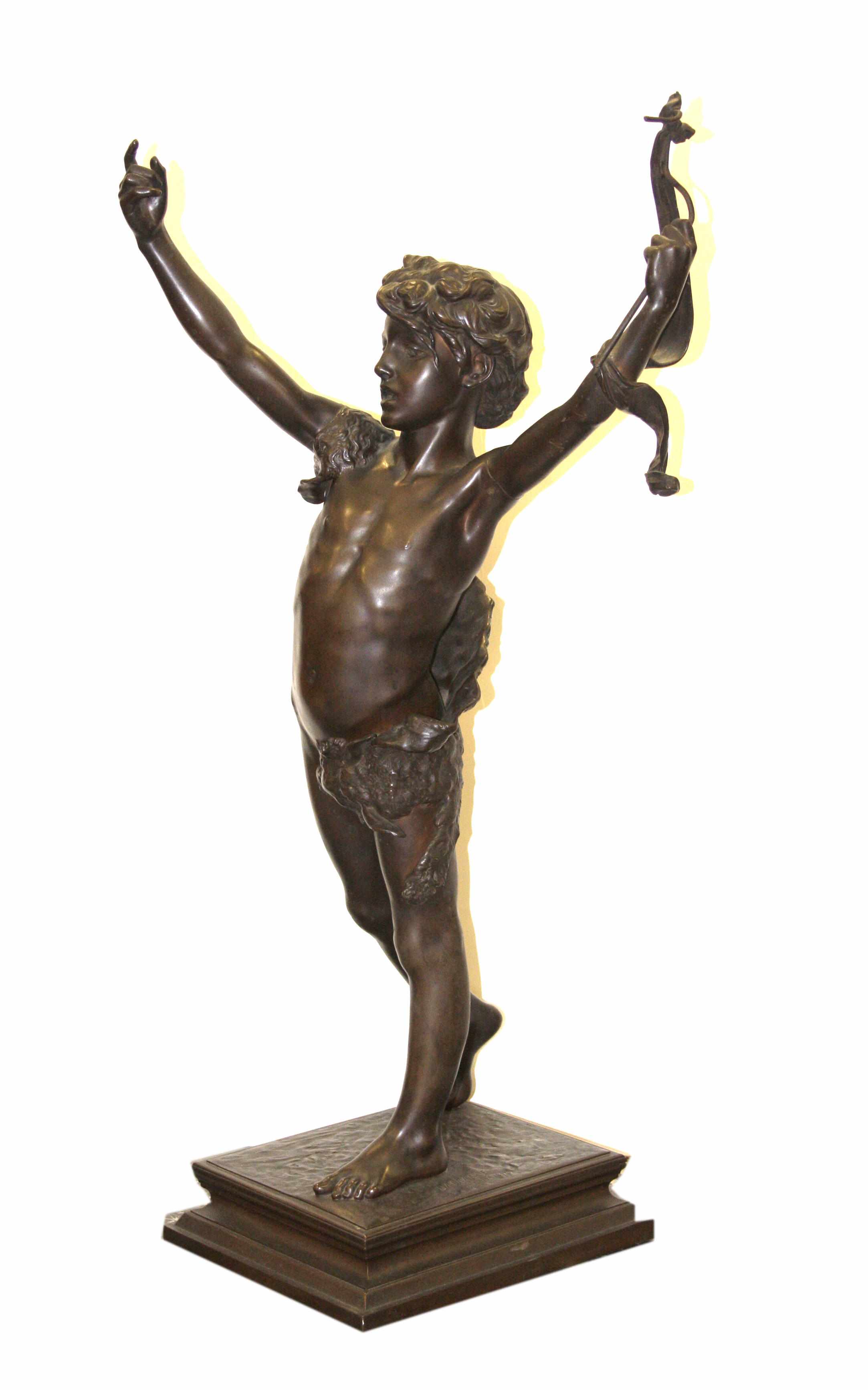 Appraisal: An Italian patinated bronze figure of a youth after a