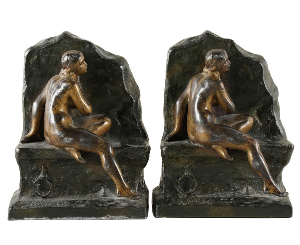 Appraisal: PAIR OF PATINATED METAL FIGURAL BOOKENDSeach signed to base G