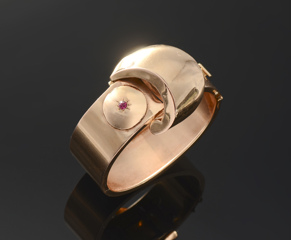 Appraisal: RETRO K ROSE GOLD BANGLE BRACELET A wide hinged bangle