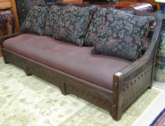 Appraisal: CARVED OAK SOFA American early th century the grape-carved oak