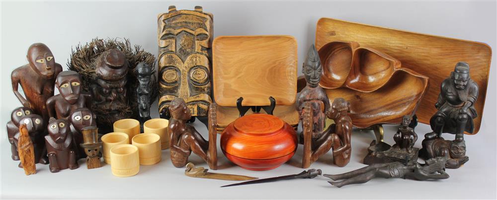 Appraisal: GROUP OF MOSTLY AFRICAN WOOD CARVINGS including three graduated squatting