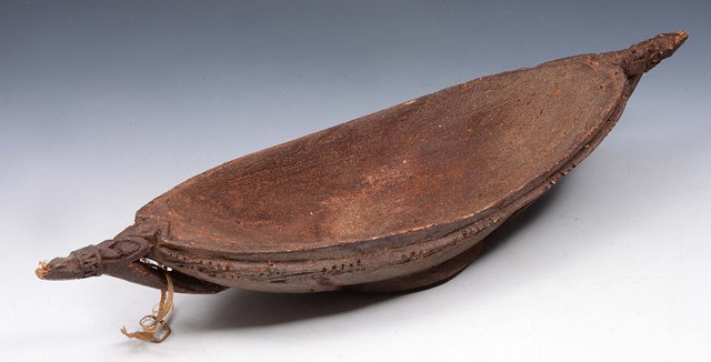 Appraisal: A NEW GUINEA RAMU COAST WOODEN BOWL with crocodile head