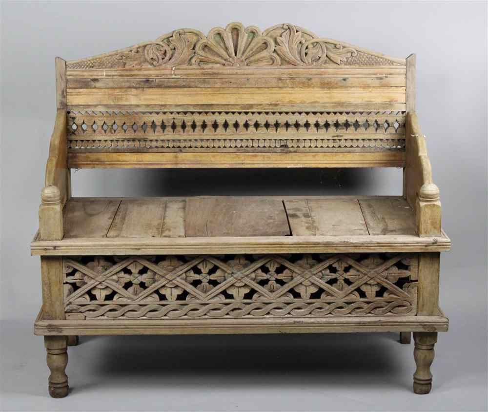 Appraisal: ANGLO INDIAN CARVED WOOD HALL BENCH WITH STORAGE COMPARTMENT having