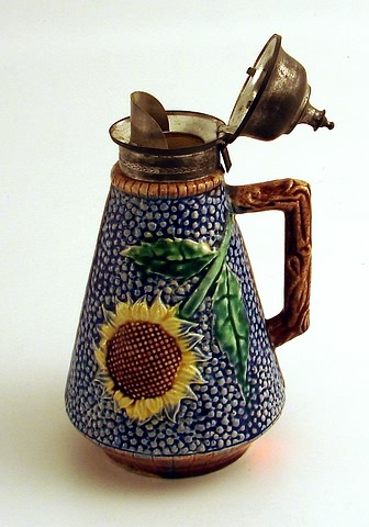 Appraisal: Griffin Smith Hill pewter cove sunflower motif t Ship plus