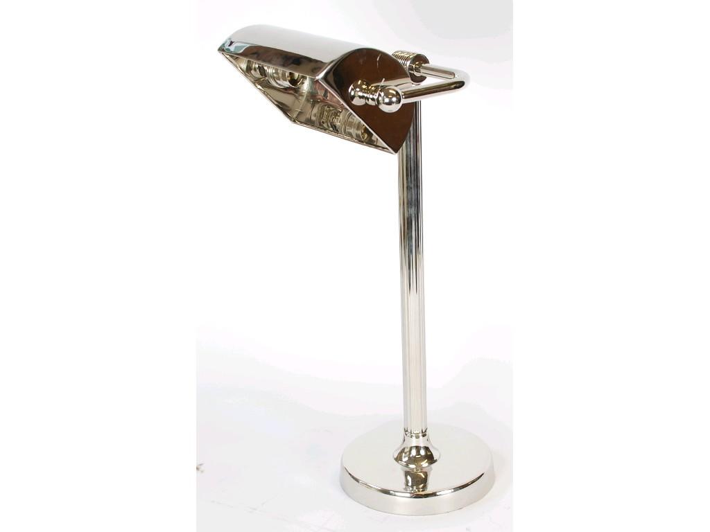 Appraisal: MODERN NICKEL PLATED DESK LAMP the curved oblong shade above