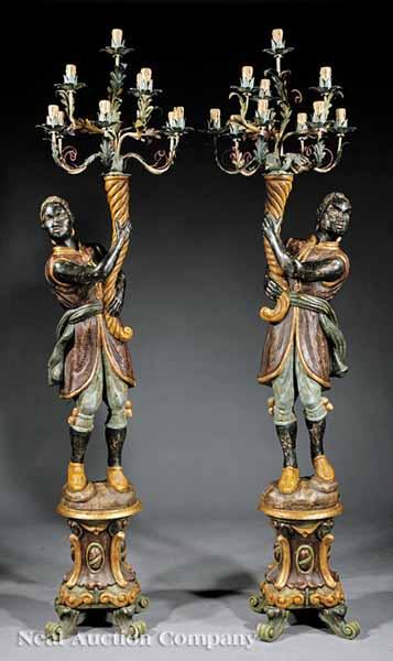 Appraisal: A Fine Pair of Continental Carved Polychromed and Gilt Blackamoors