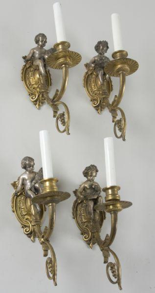 Appraisal: Set Gilt Metal Silver Tone Putti Wall Sconce ca each