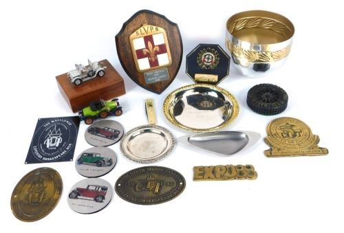 Appraisal: A group of motoring badges coasters plaques and pin trays