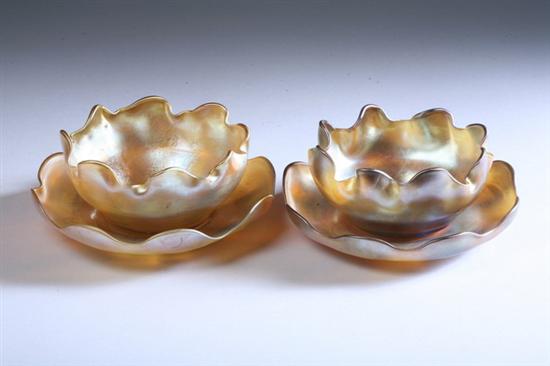 Appraisal: PAIR TIFFANY GOLD FAVRILE GLASS FINGER BOWLS AND STANDS Signed