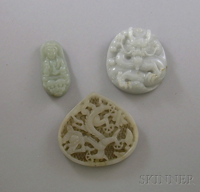 Appraisal: Three Jade Pendants round pendant with mythical beast a seated