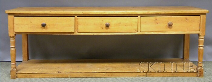 Appraisal: European Provincial Pine Three-drawer Sideboard ht lg dp in