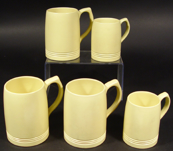 Appraisal: Five Keith Murray Wedgwood yellow glazed tankards printed full signatures