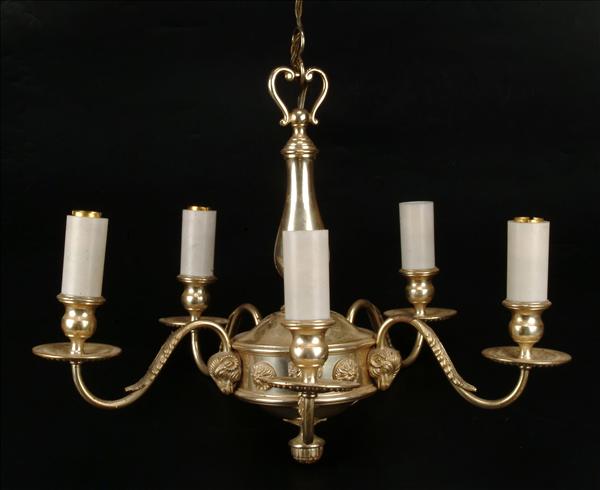 Appraisal: A silvered metal five light chandelier in the early th