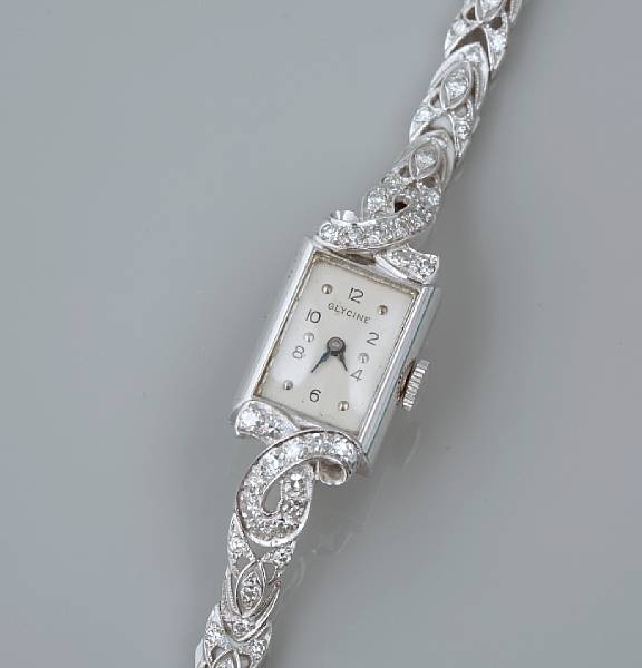 Appraisal: A diamond bracelet watch jewel movement by Ruxton platinum case