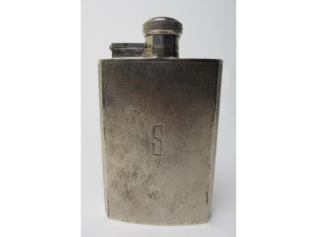 Appraisal: A silver hip flask of rectangular form with canted corners