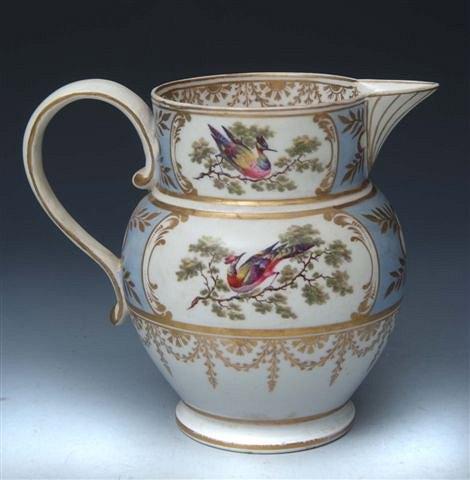 Appraisal: A CHAMBERLAIN WORCESTER JUG painted with panels of Oriental birds