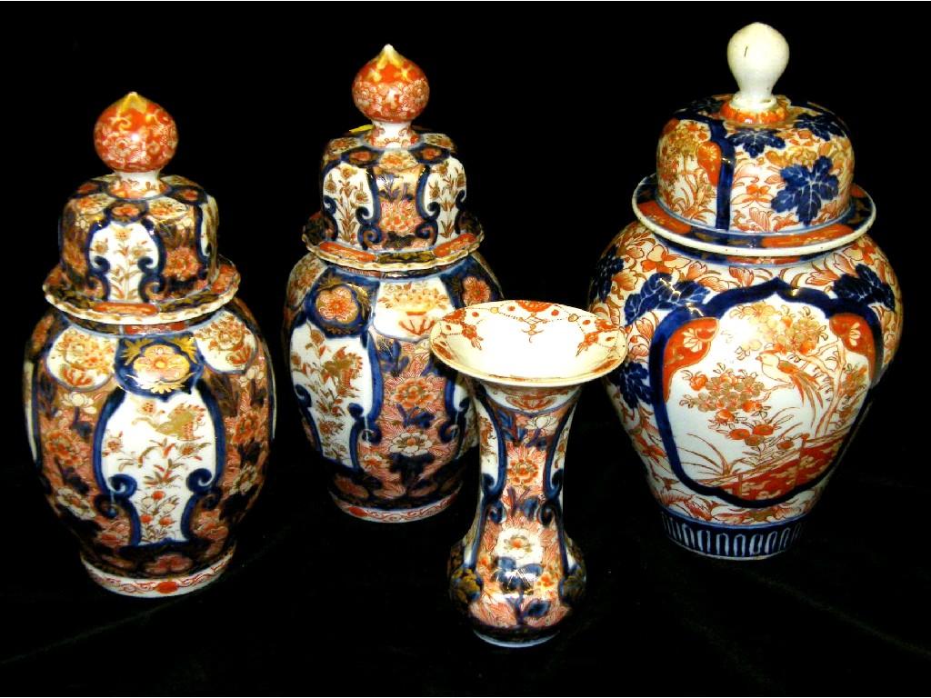 Appraisal: Pair of th century Imari bulbous jars and covers decorated