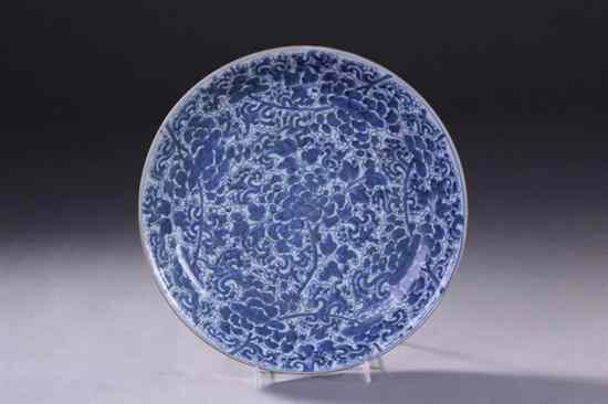 Appraisal: CHINESE BLUE AND WHITE PORCELAIN CHARGER Kangxi period Floral decoration