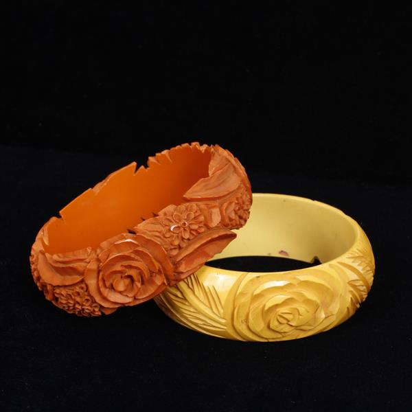 Appraisal: Two Deep Carved Floral Bakelite Bangle Bracelets dia