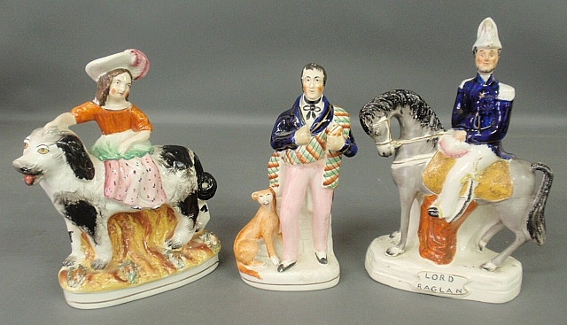 Appraisal: - Three Staffordshire figural groups incl a Royal child on