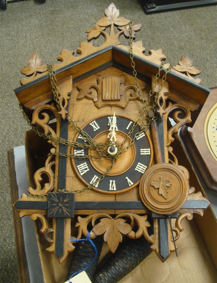 Appraisal: Cuckoo clock with weights and pendulum Estimate -