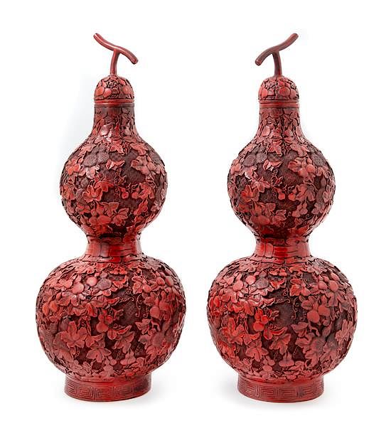 Appraisal: A Pair of Chinese Cinnabar Covered Vases Height inches A