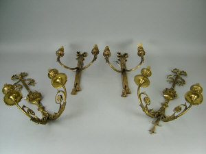 Appraisal: A pair of twin branch bronze Adam style wall lights