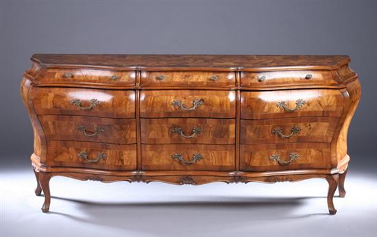 Appraisal: PROVINCIAL ROCOCO STYLE INLAID WALNUT BOMBE COMMODE th century made